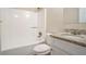 Bright bathroom with a shower-tub combo, granite countertop, and ample lighting at 2895 Fairview Rd, Covington, GA 30016
