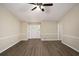Inviting living room with modern flooring, fresh paint and ample natural light at 2895 Fairview Rd, Covington, GA 30016