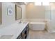 Luxurious bathroom with a soaking tub, dual vanity, walk-in shower, and modern fixtures, providing a spa-like experience at 4130 Providnce Square, Alpharetta, GA 30009