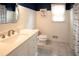 Bright bathroom featuring a modern vanity with white countertop and a tiled floor at 4130 Providnce Square, Alpharetta, GA 30009