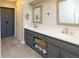 Modern bathroom featuring dual sinks, gray cabinetry, neutral colors, and ample storage, creating a serene retreat at 4130 Providnce Square, Alpharetta, GA 30009