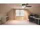 Versatile bonus room with a large window and neutral decor, perfect for an office or study at 4130 Providnce Square, Alpharetta, GA 30009