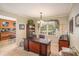 Home office featuring built-in shelving, large desk, and lots of natural light at 12510 Georgia 36, Covington, GA 30014