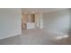 Spacious loft area with neutral carpet, access to multiple rooms, and ample natural light at 408 Westmarch Cir, Loganville, GA 30052