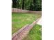 Lush backyard with a wooden privacy fence providing a serene and secluded outdoor space at 6210 Douglas Manor Ct, Douglasville, GA 30134
