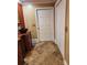 Bathroom with elegant vanity, stylish sink, and patterned tile flooring at 6210 Douglas Manor Ct, Douglasville, GA 30134