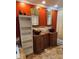 Primary bathroom with decorative double sinks, tile floor, and soaking tub at 6210 Douglas Manor Ct, Douglasville, GA 30134
