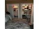 Bedroom closets showcasing ample storage and organization with double doors and shelving at 6210 Douglas Manor Ct, Douglasville, GA 30134