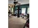 Bonus room featuring mirrors, home gym and fitness equipment, and plenty of room at 6210 Douglas Manor Ct, Douglasville, GA 30134