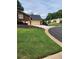 Charming home with an attached garage, a long driveway, and well-maintained lawn at 6210 Douglas Manor Ct, Douglasville, GA 30134