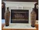 Fireplace features marble hearth, mantle, and decorative items at 6210 Douglas Manor Ct, Douglasville, GA 30134