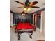 Gameroom featuring a large ceiling fan, pool table, and unique decor at 6210 Douglas Manor Ct, Douglasville, GA 30134