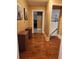 Hallway featuring hardwood floors, decor and entryways to other rooms at 6210 Douglas Manor Ct, Douglasville, GA 30134