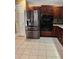 Modern kitchen featuring stainless steel refrigerator and built in ovens at 6210 Douglas Manor Ct, Douglasville, GA 30134