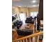 Spacious living room with ample seating and a view from the staircase at 6210 Douglas Manor Ct, Douglasville, GA 30134