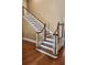 Staircase with wood treads and white risers at 6210 Douglas Manor Ct, Douglasville, GA 30134