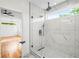 Luxurious bathroom featuring a glass-enclosed shower with marble tile and sleek fixtures at 862 Hobson Street Southwest Sw St, Atlanta, GA 30310