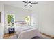 Cozy bedroom with natural light, hardwood floors, and a ceiling fan at 862 Hobson Street Southwest Sw St, Atlanta, GA 30310
