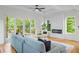 Living room with hardwood floors, a sliding glass door to a deck and a modern fireplace at 862 Hobson Street Southwest Sw St, Atlanta, GA 30310