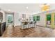 Bright and open kitchen with a kitchen island, modern appliances, and hardwood floors at 980 Casteel Rd, Powder Springs, GA 30127