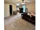 Bright bedroom with carpeted floor, ceiling fan, and natural light from the windows at 2816 Quinbery Dr, Snellville, GA 30039