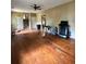 Spacious living room with wood floors and two entry doors at 2816 Quinbery Dr, Snellville, GA 30039