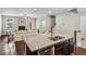 Open kitchen with a large island and stainless steel appliances, and open to the living room at 2817 White Oak Ln, Decatur, GA 30032