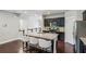 Spacious kitchen featuring a large island, stainless steel appliances, and dark cabinetry at 2817 White Oak Ln, Decatur, GA 30032