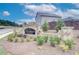 Stone community entrance sign with manicured landscaping creating a welcoming and prestigious arrival experience at 702 Bristol Dr, Loganville, GA 30052