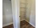 Pantry with wire shelving and vinyl floors at 702 Bristol Dr, Loganville, GA 30052