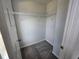 Compact walk-in closet with carpet and wire shelving at 702 Bristol Dr, Loganville, GA 30052