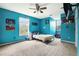 Stylish bedroom featuring plenty of sunlight from the large windows at 1235 Waterwood Dr, Loganville, GA 30052