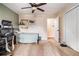 Bedroom with a ceiling fan, space for computer set up, and large closets at 1235 Waterwood Dr, Loganville, GA 30052