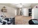 Large bedroom featuring carpet, a ceiling fan, and multiple closets and doorways at 1235 Waterwood Dr, Loganville, GA 30052