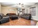 Comfortable living room area with wood floors and ceiling fan at 1235 Waterwood Dr, Loganville, GA 30052