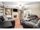 Spacious living room featuring a fireplace and comfortable seating arrangement at 1235 Waterwood Dr, Loganville, GA 30052