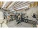 Basement with a home gym, showcasing weightlifting equipment and storage shelving at 3718 Lake Vis, Douglasville, GA 30135