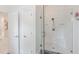 Modern bathroom showcasing glass shower, white tiling, and neutral color palette at 3718 Lake Vis, Douglasville, GA 30135
