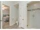 Bathroom features a tiled walk-in shower, toilet, and connection to a bedroom at 3718 Lake Vis, Douglasville, GA 30135