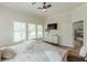 Spacious bedroom with ample natural light, dark ceiling fan, and modern furnishings at 3718 Lake Vis, Douglasville, GA 30135