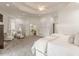 The airy bedroom has an expansive layout, trey ceiling, sitting area, and access to an attached bathroom at 3718 Lake Vis, Douglasville, GA 30135