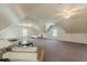 Expansive bonus room with a neutral color scheme, offering flexible space for various activities at 3718 Lake Vis, Douglasville, GA 30135