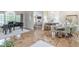 Elegant foyer showcasing hardwood floors, a grand piano, and a dining area set for a meal at 3718 Lake Vis, Douglasville, GA 30135