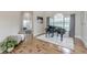Bright foyer featuring hardwood floors and a grand piano beneath a large arched window at 3718 Lake Vis, Douglasville, GA 30135