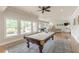 A luxurious game room features a pool table, hardwood floors and recessed lighting at 3718 Lake Vis, Douglasville, GA 30135