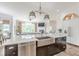 Spacious kitchen with stainless steel appliances, large island, and a view of the adjacent living room at 3718 Lake Vis, Douglasville, GA 30135