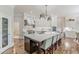 Kitchen features custom cabinets, granite countertops, a large island, and an open layout at 3718 Lake Vis, Douglasville, GA 30135