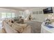 Bright and open living room with cozy seating, stylish decor, and large windows at 3718 Lake Vis, Douglasville, GA 30135