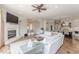 Inviting living room features a fireplace, white couch, and hardwood floors at 3718 Lake Vis, Douglasville, GA 30135