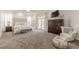 Spacious main bedroom with a large bed, neutral colors, and lots of natural light at 3718 Lake Vis, Douglasville, GA 30135